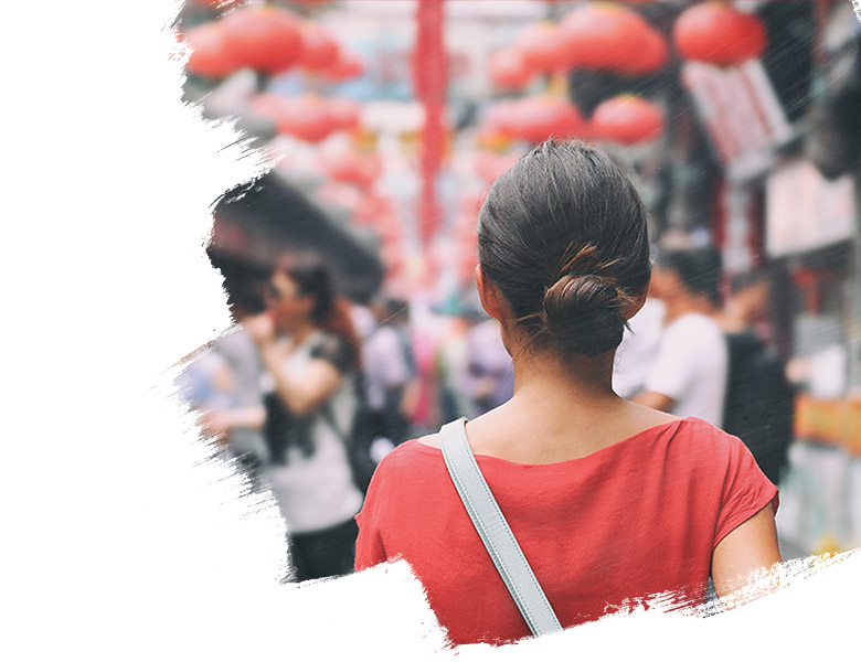 Tourist walking in city streets on Asia vacation tourism