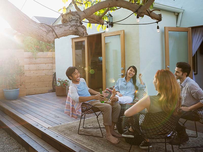 People sitting and talking in a coliving communal