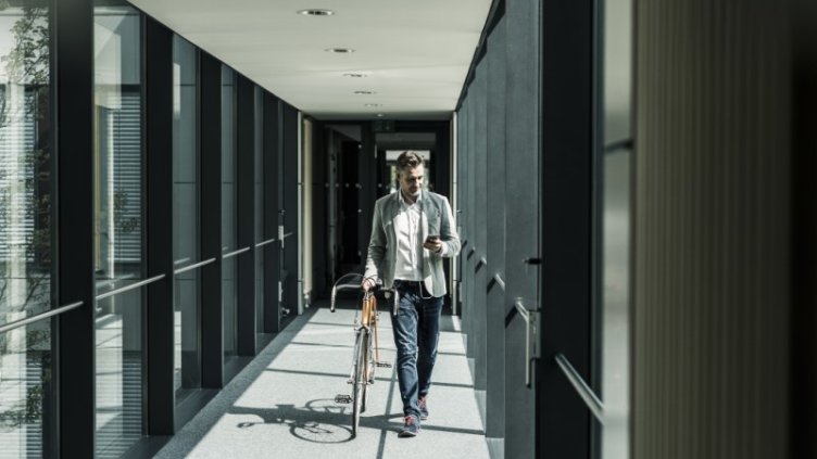 employees travelling to the office on bicycle