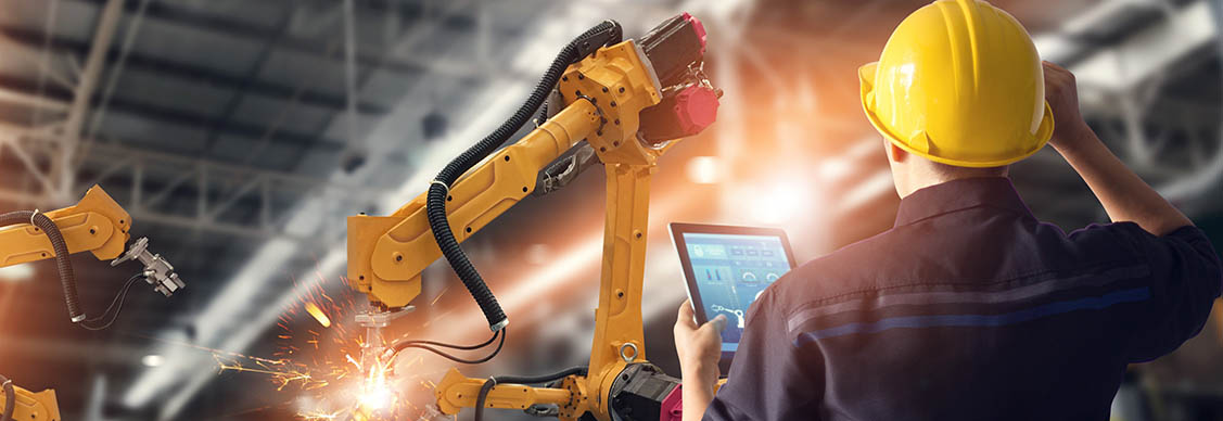 A man with tablet in construction site