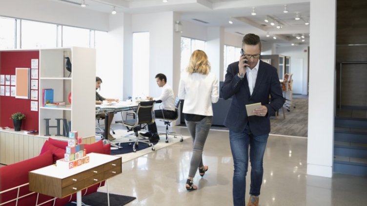 Employees inside the tech-enabled office