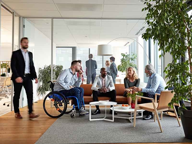 Team meeting in office reception room