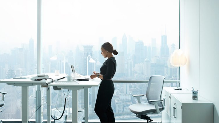 A woman working in a laptop