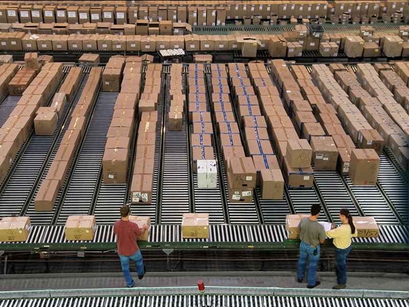 Cardboard boxes on conveyor belt